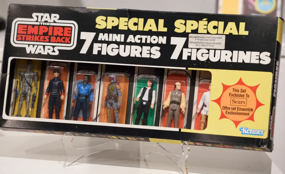 Window box with plastic inserts for action figure packaging